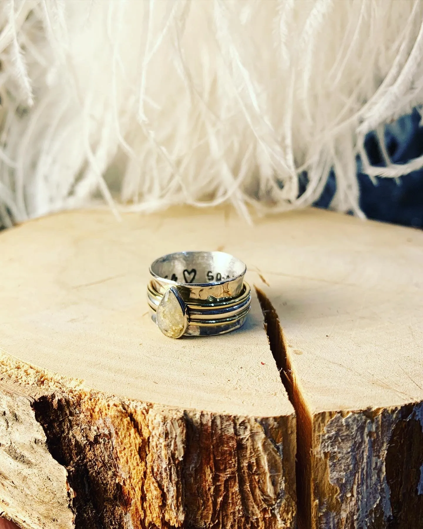 Breastmilk teardrop spinning ring